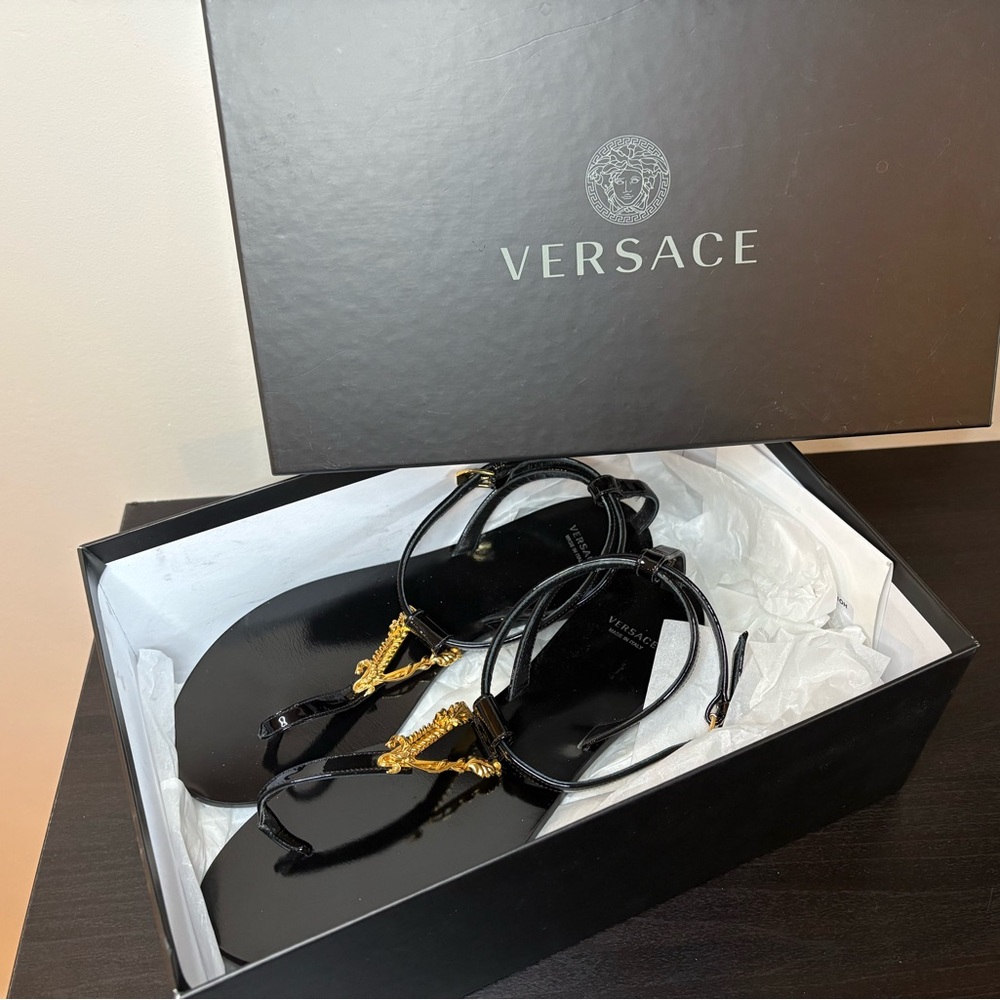 Versace Black Flats with Gold Detailing